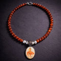16" Carnelian with Sterling Silver Beads and a Cowgirl Pendant