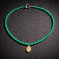 17" Green Gemstones with a Religious Pendant from San Miguel Mexico