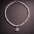 17" Pale Pink Quartz with Sterling Silver Beads and a Religious Medallion