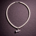 15" Rice Pearls with a Sterling Silver Megaphone