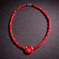 17" Red Coral with Sterling Silver Spacers with a Larger Red Coral Stone Accent